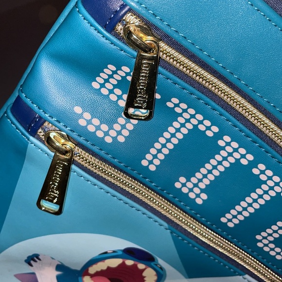 Loungefly rare LILO & stitch Elviscrossbody NwOT damage at left corner blue teal - Picture 6 of 9
